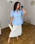Комплект от пола и блуза с пеплум от полиестер, ликра и найлон, с моден дизайн, на снимката.