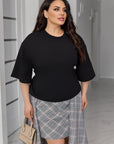 Комплект с карирана пола от IT, с полиестер и вискоза, показано на изображението.