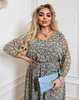 Flowy floral chiffon dress made of 50% viscose and 50% polyester, featuring a lightweight, breezy design with a colorful flower pattern.