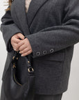 Short blazer coat by YR, made of 60% wool, 30% polyester, 10% cashmere, shown in a stylish tailored fit.