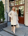 Леко палто от каракул